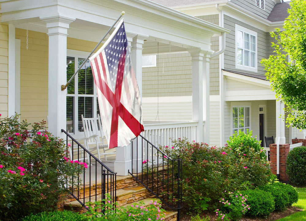 an american flag on a porch of a house