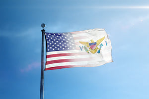 an american flag flying high in the sky