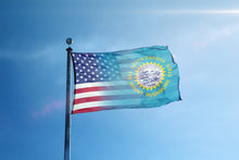 Load image into Gallery viewer, the flag of the state of michigan flying in the wind
