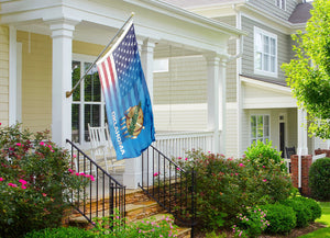 a flag on a porch of a house