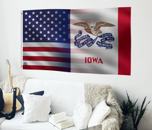 Load image into Gallery viewer, a living room with a couch, guitar, and american flag
