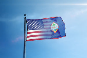 the flag of the state of florida flies high in the blue sky