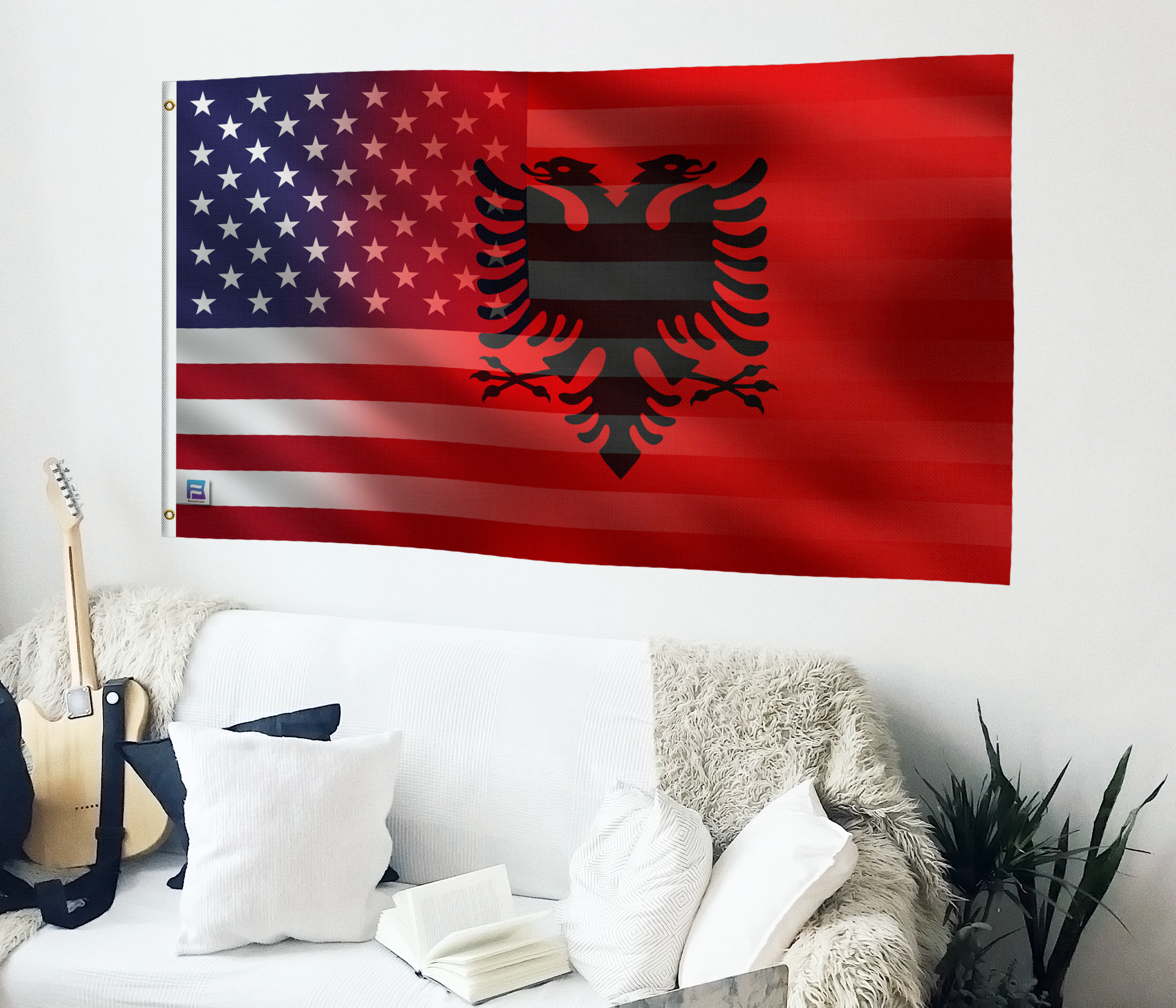 a flag hanging on a wall next to a couch