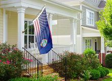 Load image into Gallery viewer, a flag on a porch next to a house
