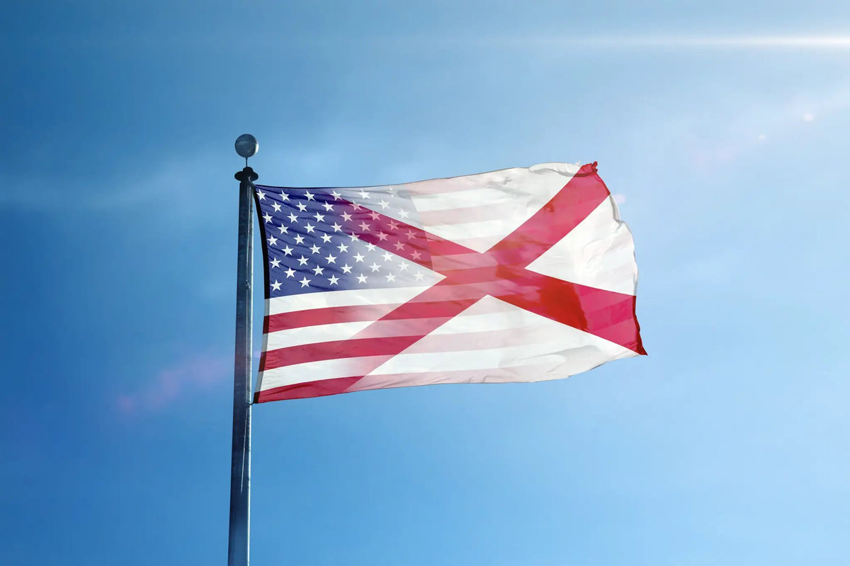 House flag Alabama & American Flag Blend; blue field with stars and red diagonal cross, fluttering in the wind.