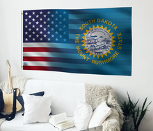 Load image into Gallery viewer, a flag hanging on the wall of a living room

