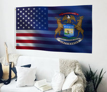 Load image into Gallery viewer, a living room with a couch and a flag hanging on the wall
