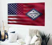 Load image into Gallery viewer, a living room with a couch, guitar and an american flag
